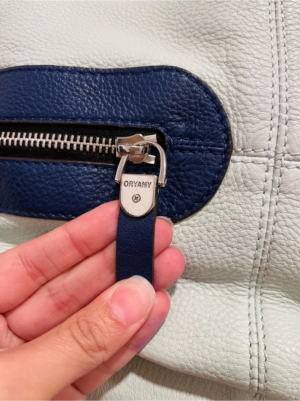 Oryany Mint and Navy Leather Backpack